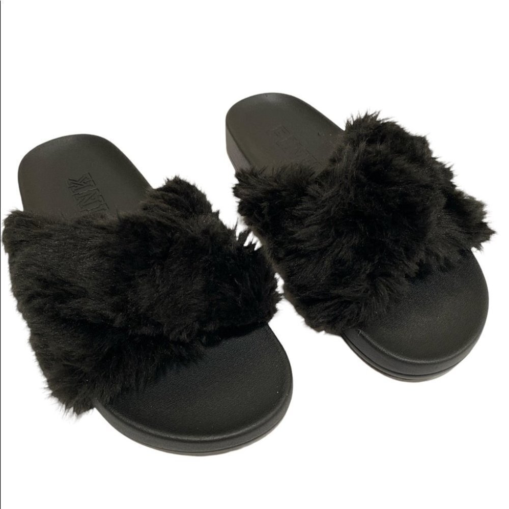 Pink fuzzy slippers